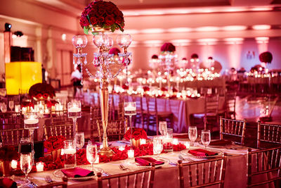 View of wine glass on table at illuminated restaurant