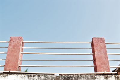 Low angle view of metallic structure against clear sky