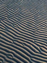 High angle view of sand dunes on beach