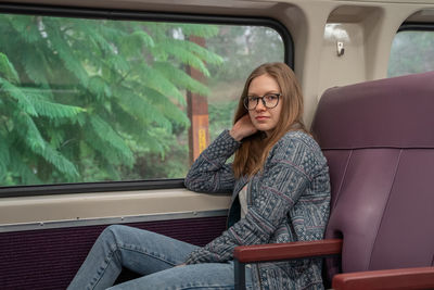 Woman sitting in car