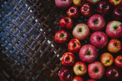 High angle view of apples in basket on table