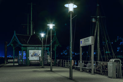 Illuminated street lights at night