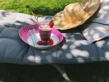 High angle view of milkshake in garden