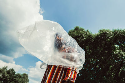 Low angle view of person against the sky