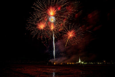 Firework display at night