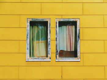 Full frame shot of yellow window of building