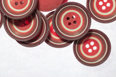 High angle view of various buttons on table