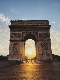 Low angle view of monument at sunset