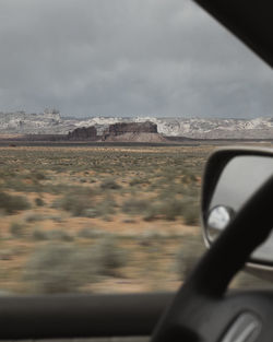 Road seen through car window