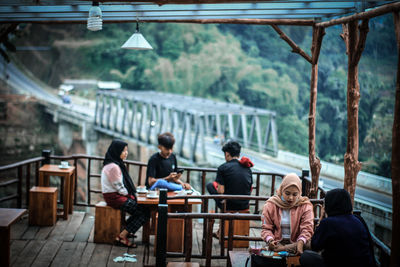 People sitting on table at cafe