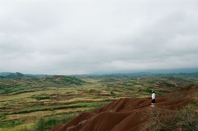 Man standing on landscape