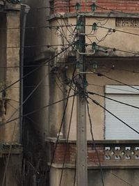 Building with cables in background