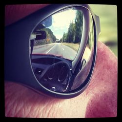 Close-up of side-view mirror