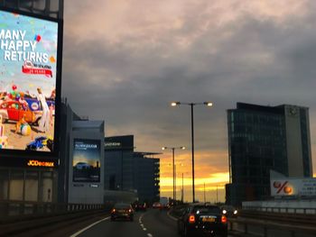 Traffic on road at dusk