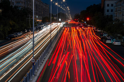 High angle view of light trails on road at night