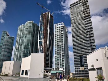 Low angle view of buildings against sky in city