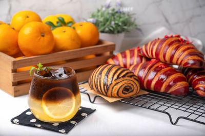 Close-up of orange fruits on table