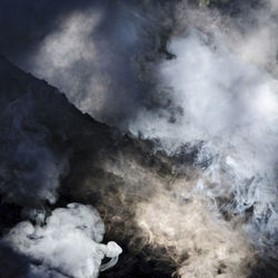 Smoke from charcoal pile, hunneberg, sweden, europe