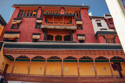 Low angle view of building in city against sky