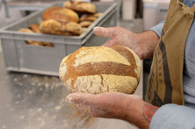 Close-up of man preparing food