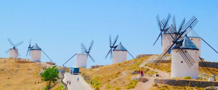 Traditional windmill against clear blue sky