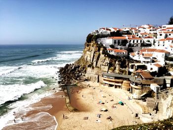 Panoramic view of beach against clear sky