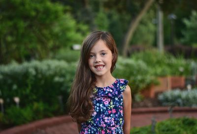 Portrait of smiling girl with long hair