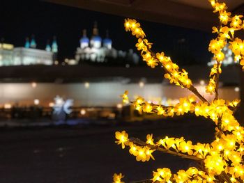 Illuminated lights in city at night