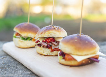 Close-up of burger on cutting board