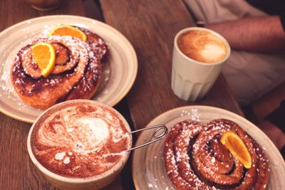 Close-up of dessert and coffee served on table