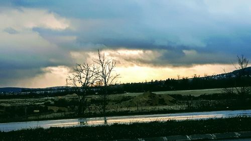 Scenic view of landscape against sky during sunset