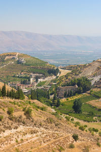 Panorama of bekaa landscape, valley with roman niha temples and vineyard hills, lebanon, middle east