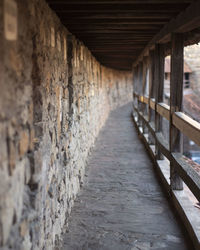 Empty corridor along walls