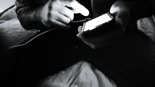 Close-up of woman holding camera