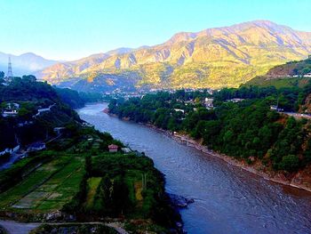 Scenic view of river and mountains