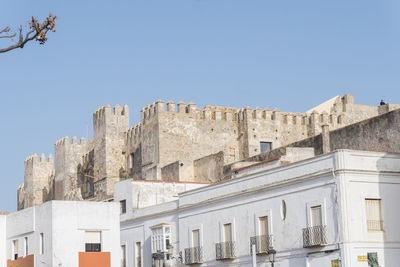 Low angle view of building against clear sky