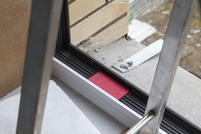 High angle view of metal grate on table
