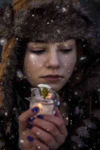 Portrait of a woman in snow