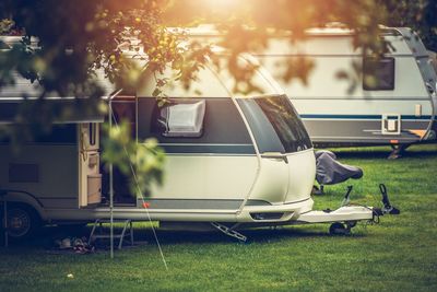 Motor home on grassy field in park