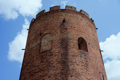 Low angle view of old building against sky