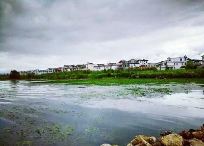 View of river against cloudy sky