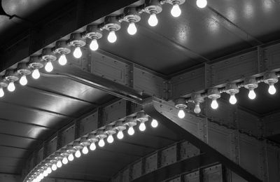 Low angle view of illuminated ceiling