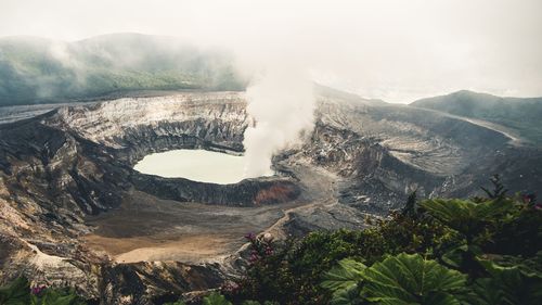 High angle view of volcanic landscape against sky