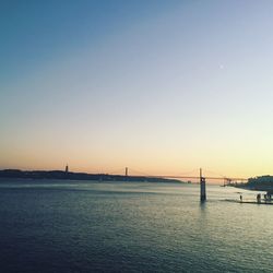 View of suspension bridge at sunset