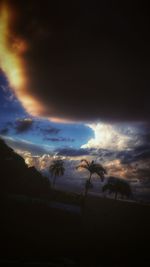 Scenic view of landscape against cloudy sky