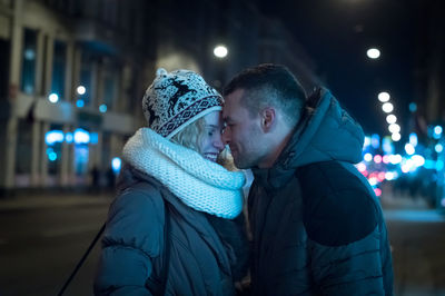 Romantic couple wearing warm clothing during winter