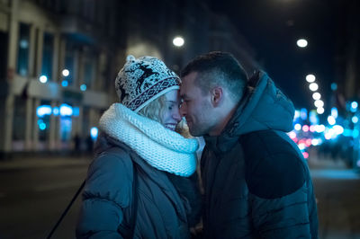 People in illuminated during winter at night