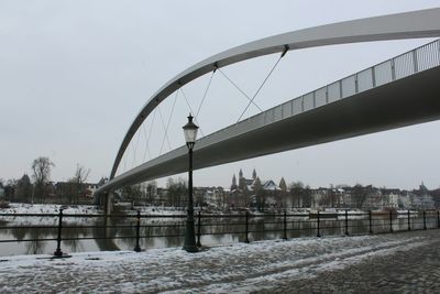 Bridge over river against sky