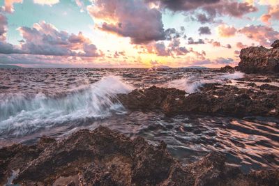 Scenic view of sea against sky during sunset