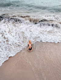 High angle view of girl on beach